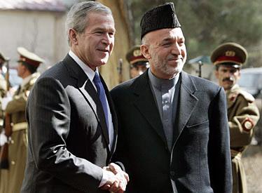 Karzai inquires after health of Bush, talks to Gul