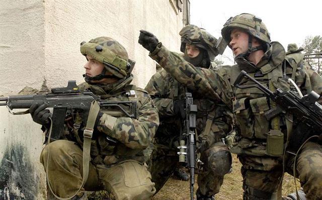 Photo: پولند سربازان خود درافغانستان را افزايش مى دهد
