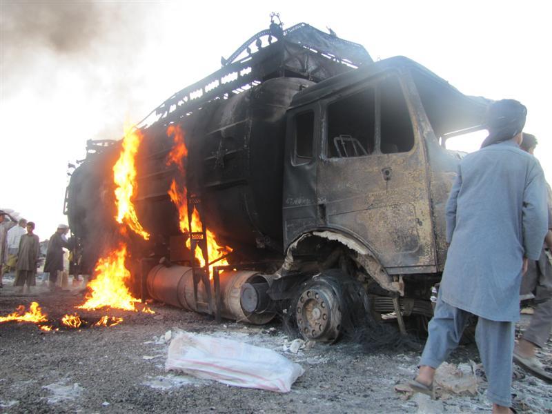 Fuel tanker torched, 4 police injured