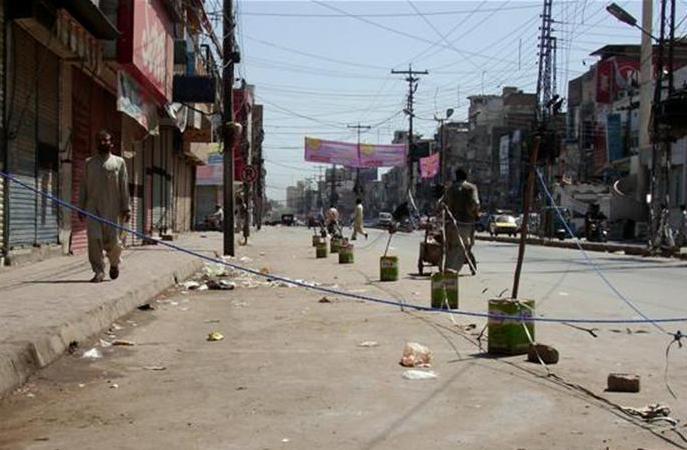A dozen dead in Peshawar car bombing