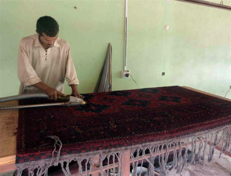 Carpet weavers complain of high costs