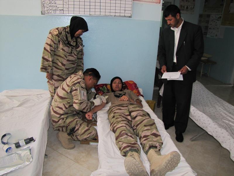 سربازان آيساف به مريضان باميان خون اهدا کردند