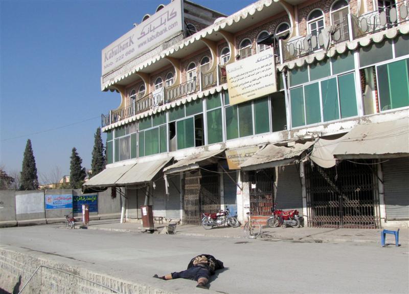 Militant killed after attacking bank