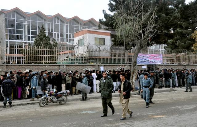 Karzai urged to sign higher education law
