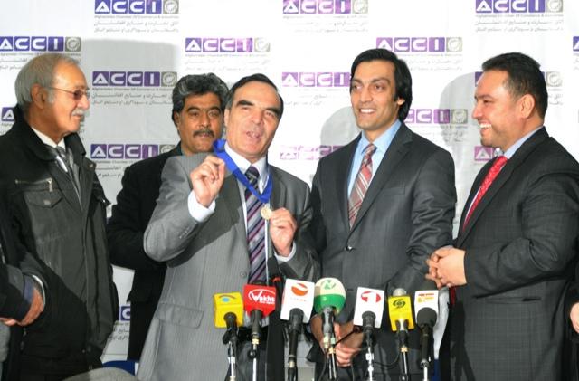 Mohammad Sediq Afghan shows his medal