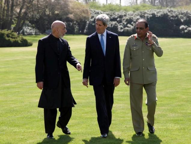 Karzai, Kerry confer on border tiff, security pact