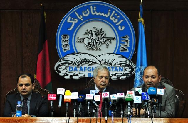 Da Afghanistan Bank and CJTF officials during a press conference
