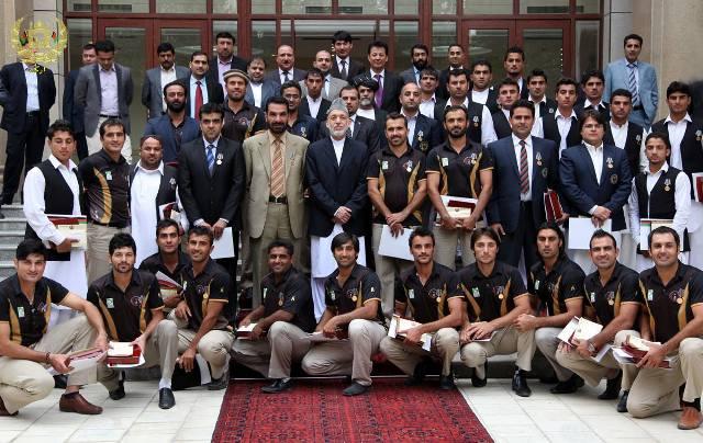 President honours cricketers with awards