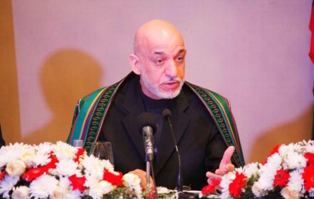 Karzai says he encouraged elder brother to quit
