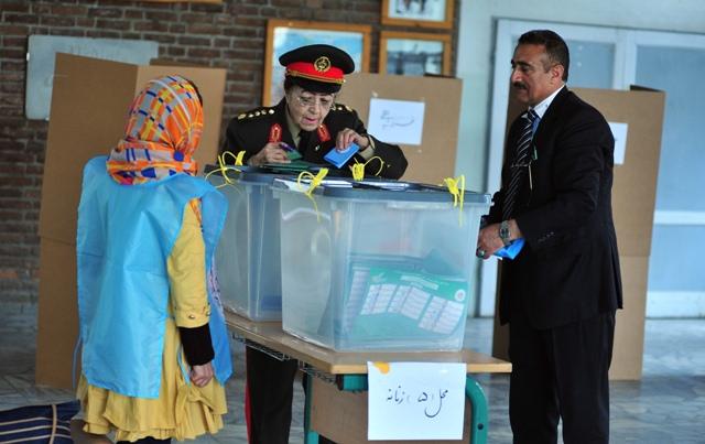 Military woman casting her vote