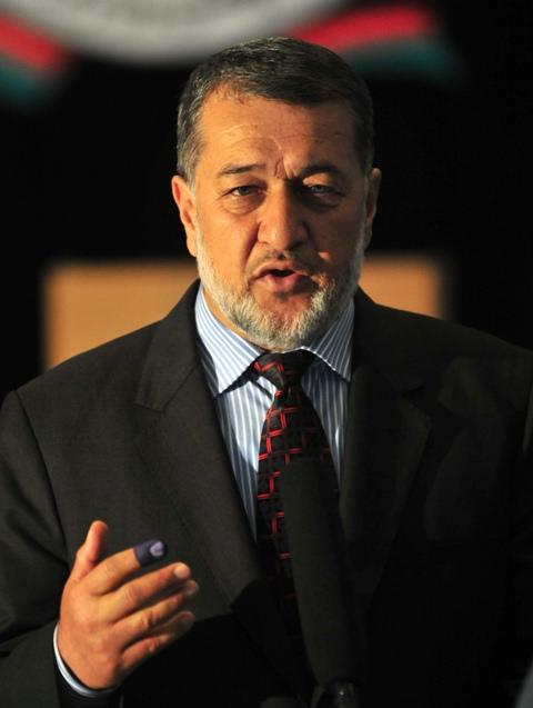 Gen. Bismillah Mohammadi, shows his coloured finger