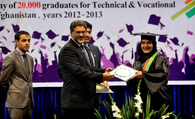 Education Minister awards diploma to a female graduate