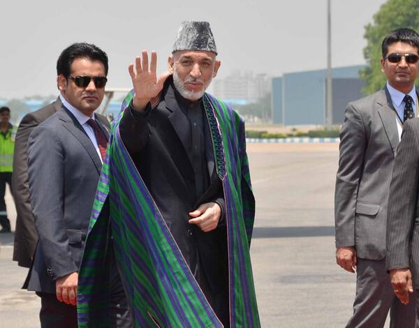 Karzai returns home from Indian trip