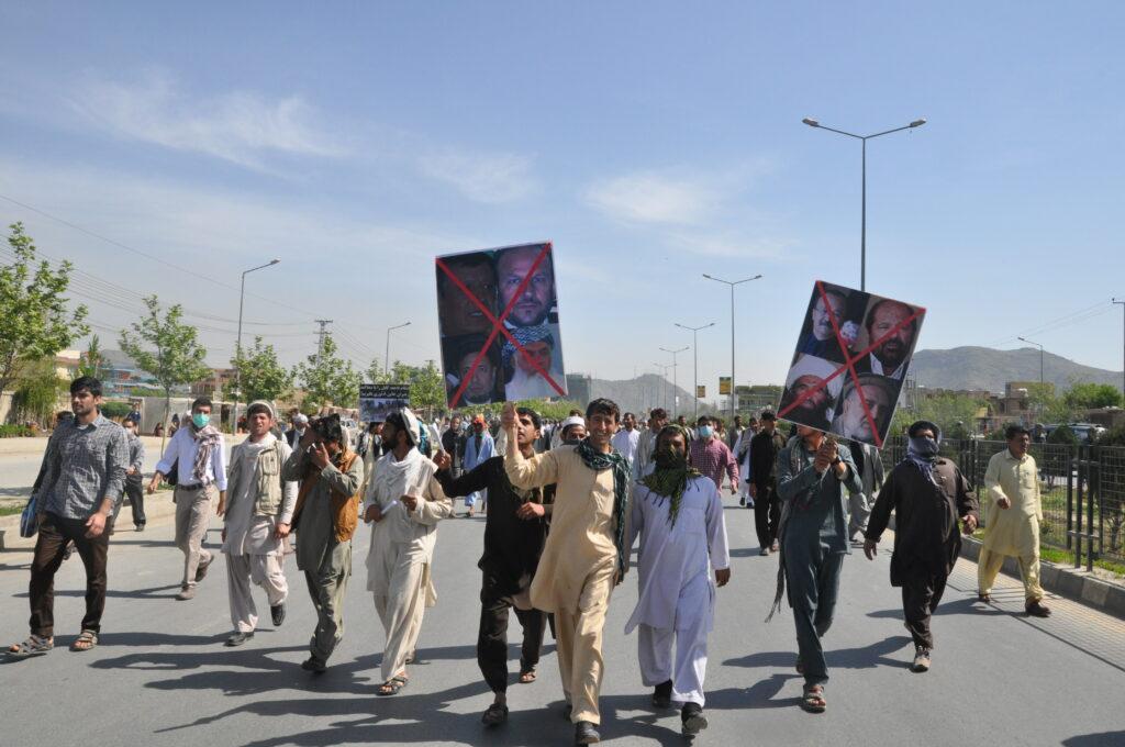 Protestors slam communists, Taliban