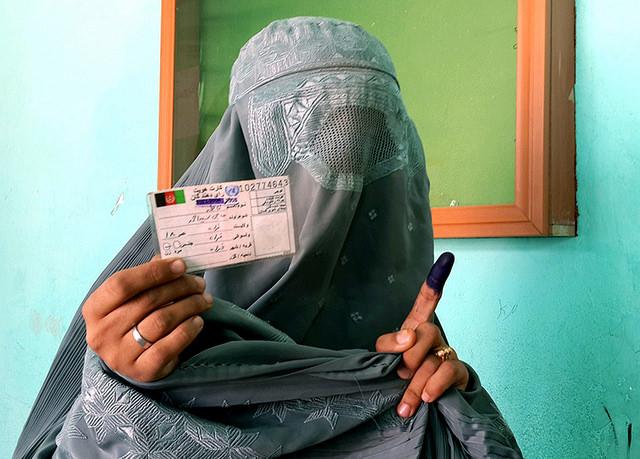 Burqa-clad female voter