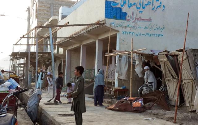 Bombs blasts destroyed shops in Farah