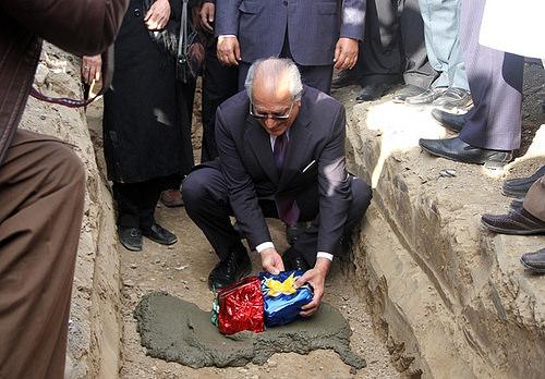 Khalilzad lays the fornication stone for a school in Kabul