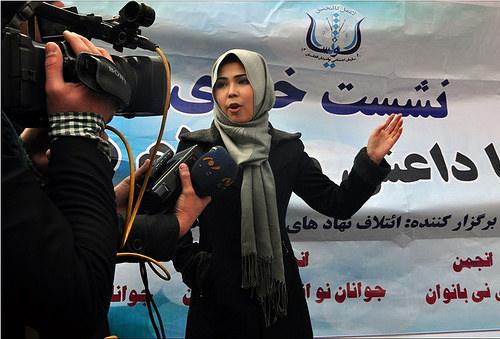 Woman addresses to journalists