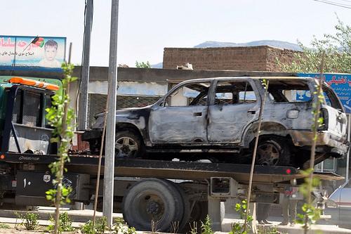 A police van damaged in magnetic bomb explosion