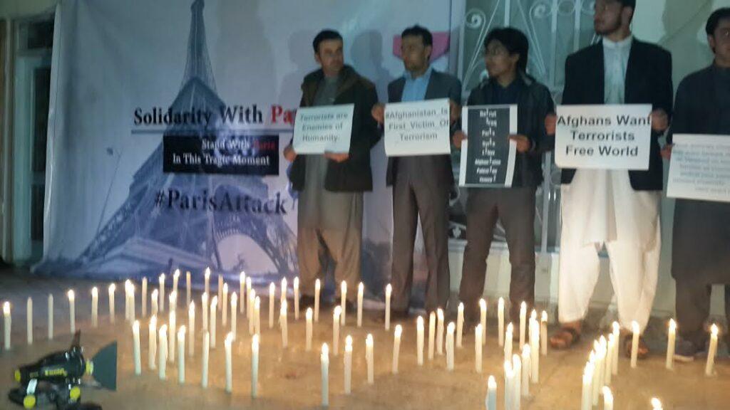 Afghan activists light candles to mourn Paris deaths