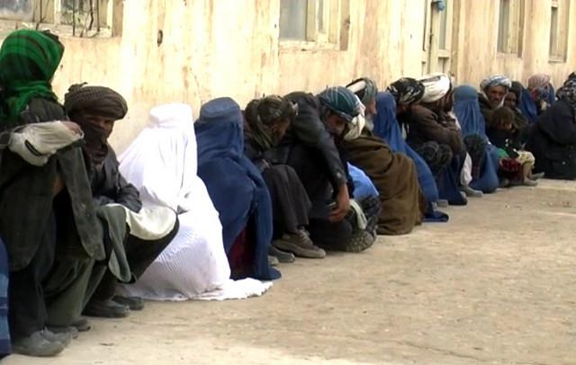 Displace Persons (IDPs) siting in line