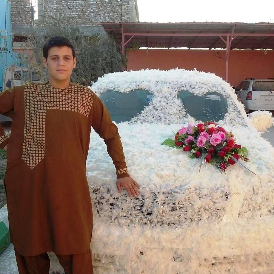 Decorating bride cars with feathers now tradition in Nimroz