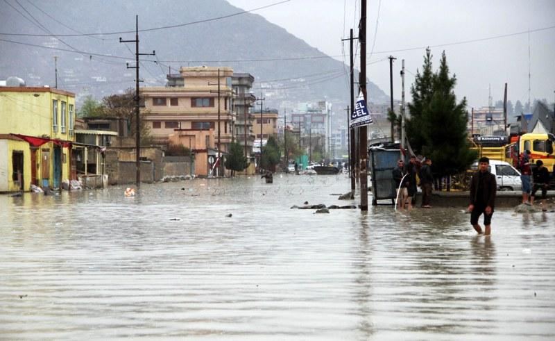 Kabulis in trouble as rain turns streets into ponds