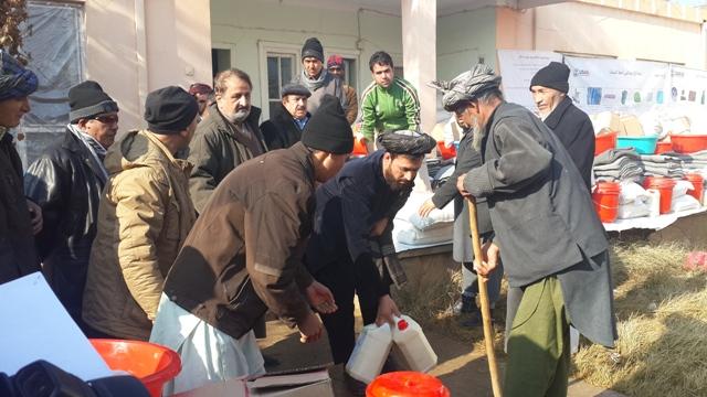 War-affected families receive aid in Kunduz, Jawzjan