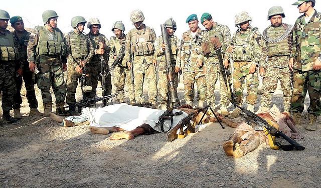 The corpses of the armed militant in Farah
