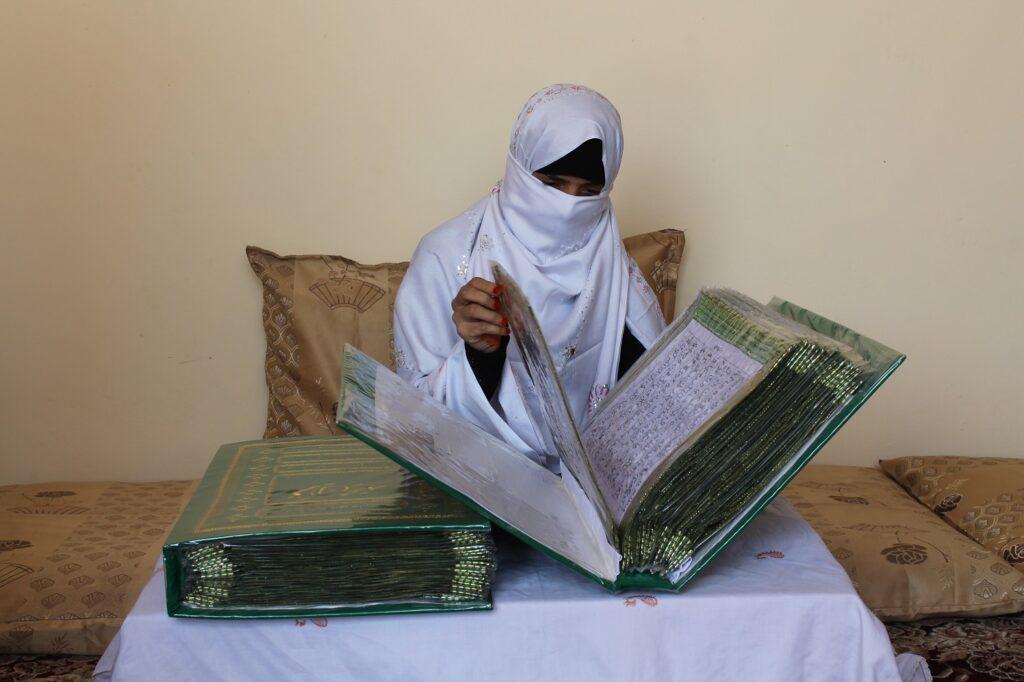 Kandahar woman scripts Quran in delicate embroidery