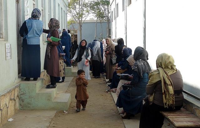 Jawzjan women wait in a queue for vote