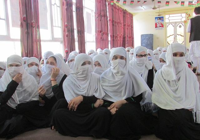 Girls to school, women to return to work soon: Mujahid