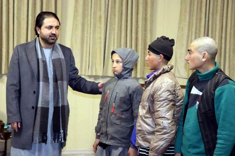 Faryab governor Naqibullah with freed children