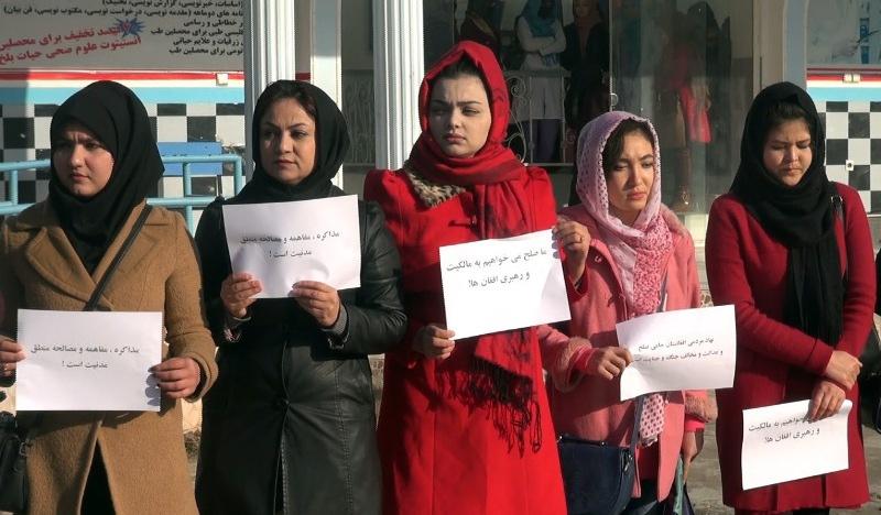 Women during a rally call for Afghan-led peace