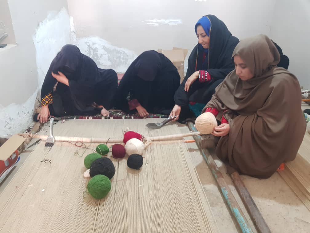 Woman opens first carpet weaving shop in Nimroz