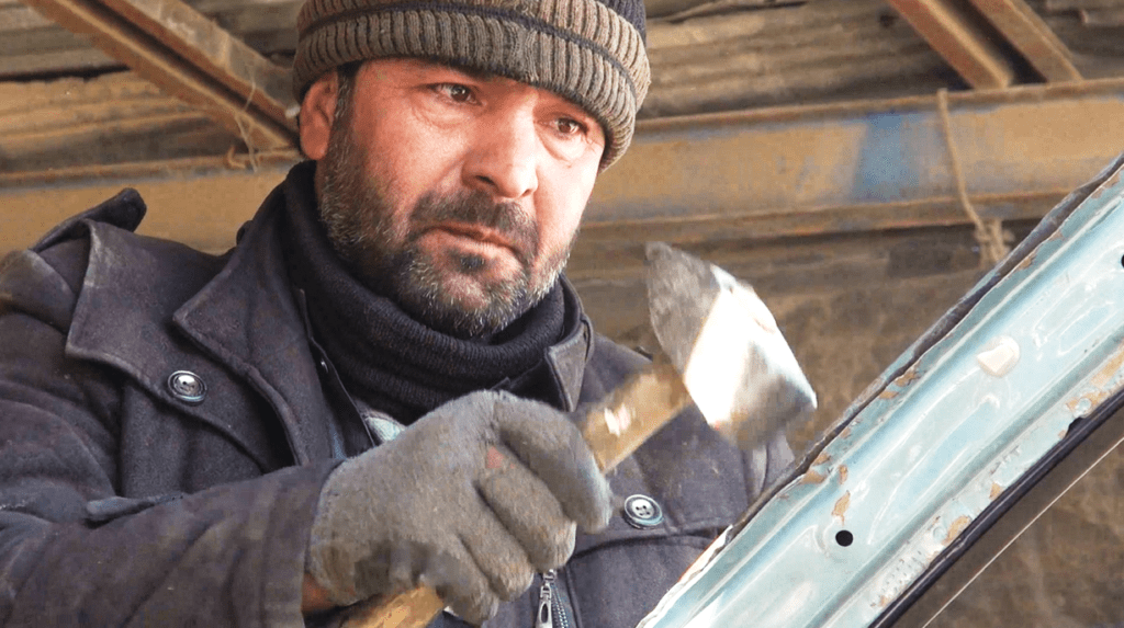 Film director runs auto dent repair shop in Paktia
