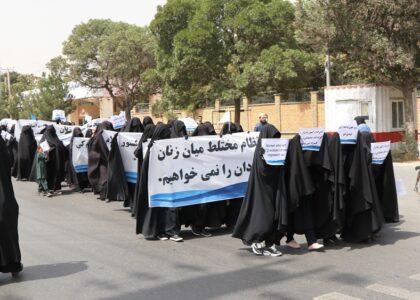 Carrying Taliban flags, female students rally for rights