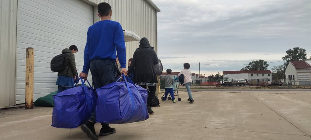 Afghans evacuees being moved from camps to new homes in US