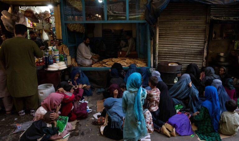 Poor Afghan women beg for bread at bakeries to survive