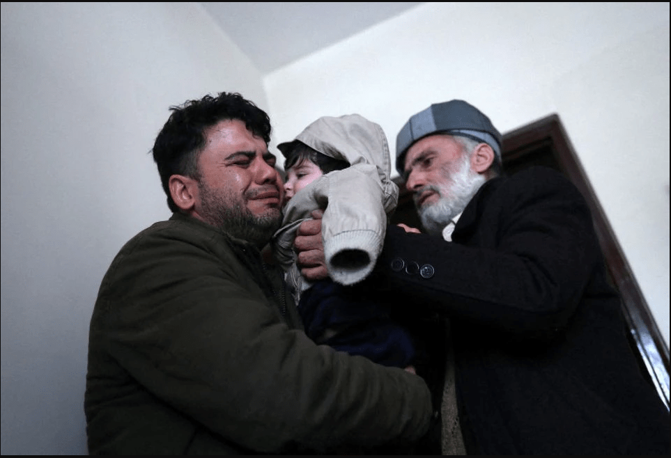 Baby lost in Kabul airport chaos reunited with family