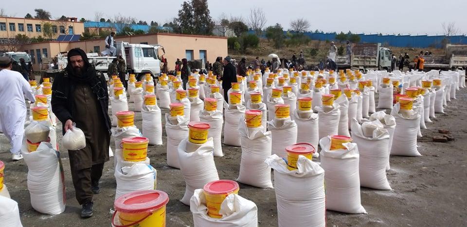 Hundreds of orphaned children receive food aid in Khost