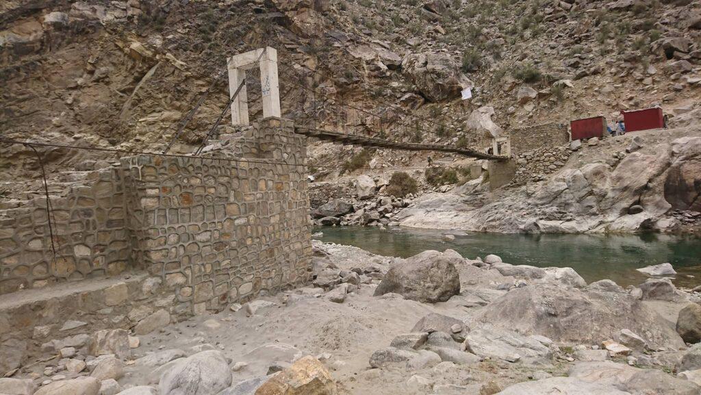 Nuristan residents pool pine nuts to build bridge