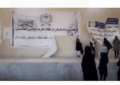 Some women tear down meeting banners in Bamyan