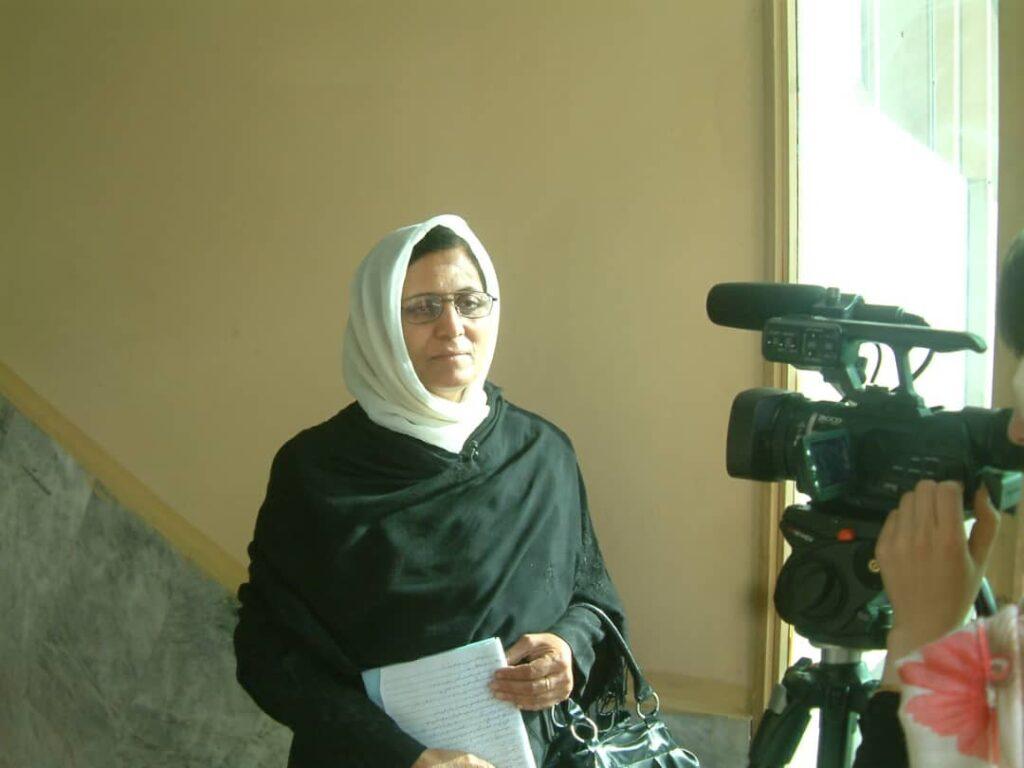 Rebuild Afghanistan, wear hijab, poetess asks women