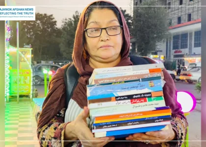 Aziza selling books to eke out living for her children in Kabul