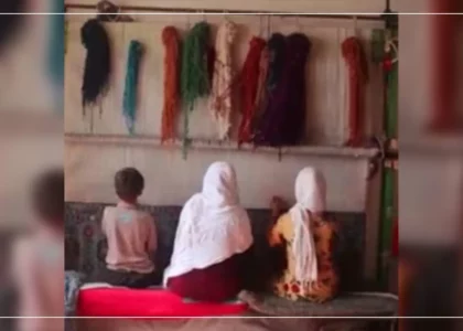 Zainab weaves carpets at night and studies during daytime