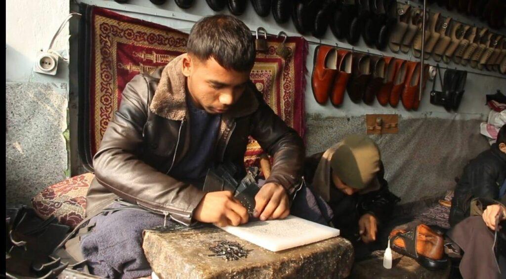 Kunduz shoemakers say their business recently stagnated