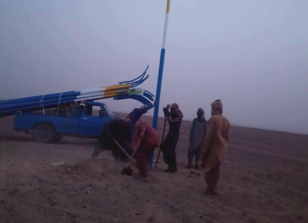 Solar streetlights being installed in Helmand road