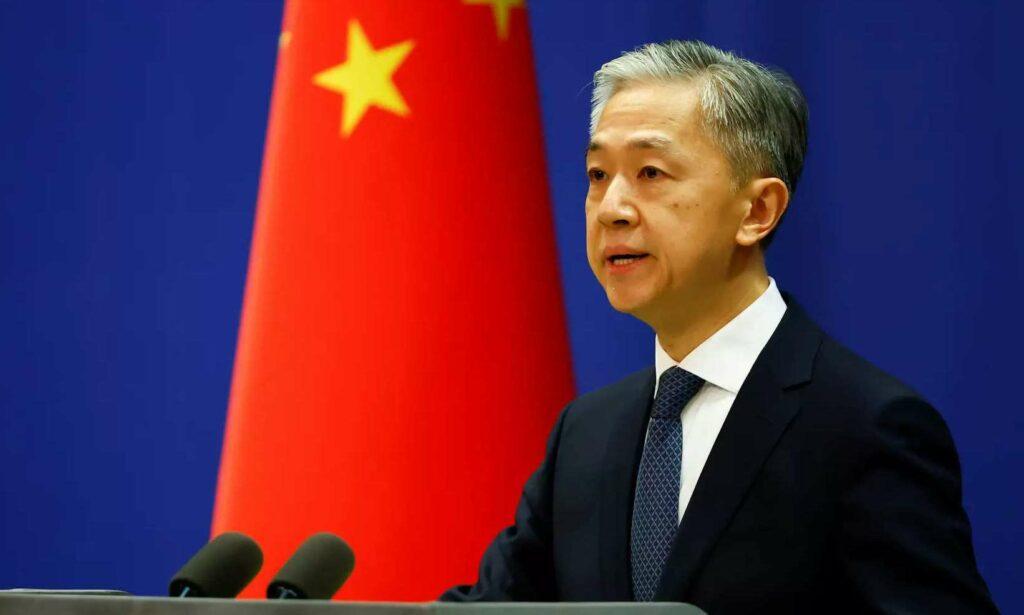 China hails IEA economic, security policies
