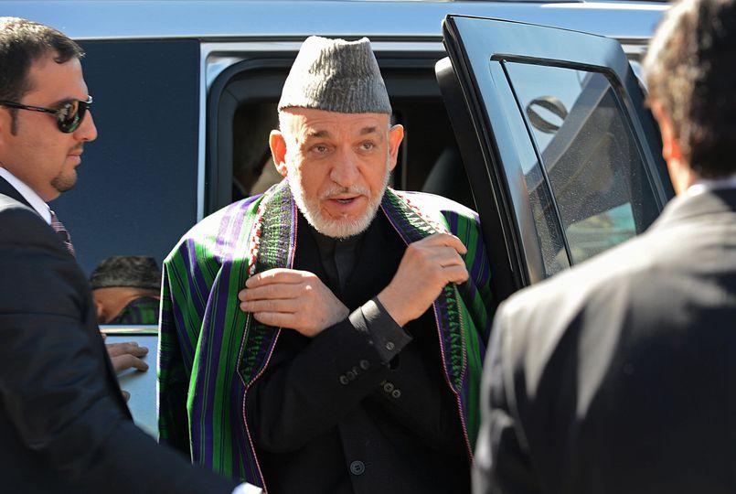 Ex-president Karzai returns from US